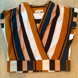 I am selling a Manteau blouse in the colors brown,white,green,black and pink